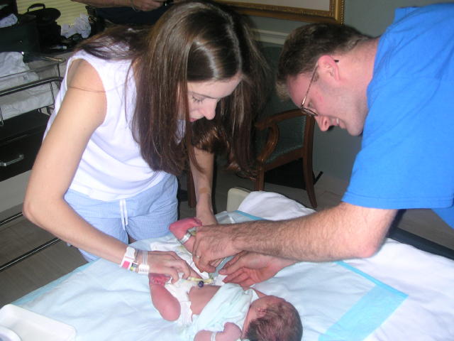 mom and dad, first diaper change